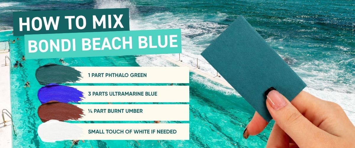 How to mix Bondi Beach Blue paint swatch held against Bondi Icebergs pool and ocean
