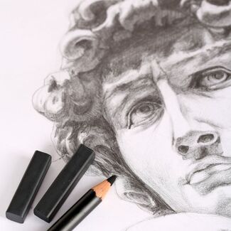 What are some benefits of using charcoal sticks for drawing?